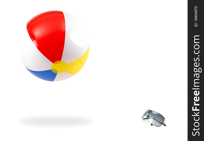 Sunglasses and a beach ball against a white background. Sunglasses and a beach ball against a white background