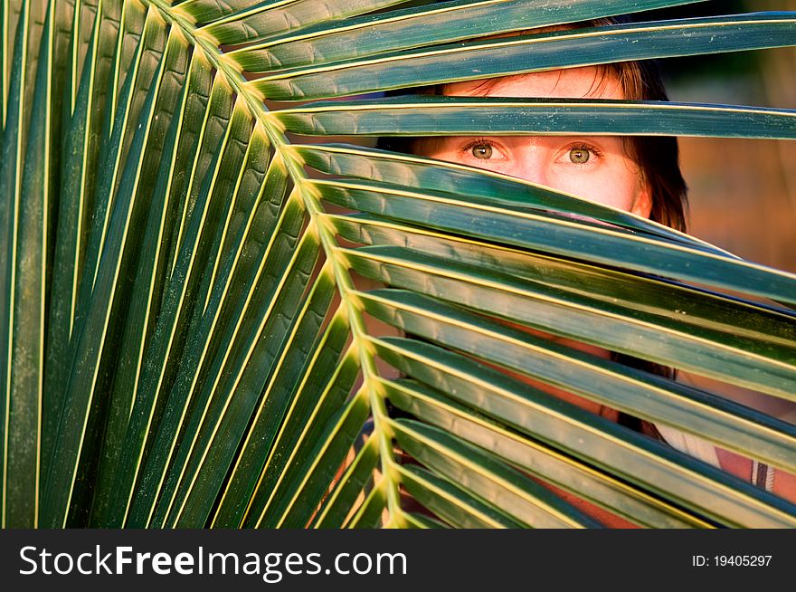 Portrait of the woman with a palm branch. Portrait of the woman with a palm branch