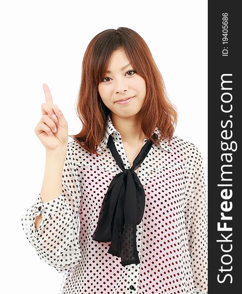 Portrait of young japanese business woman pointing. Portrait of young japanese business woman pointing