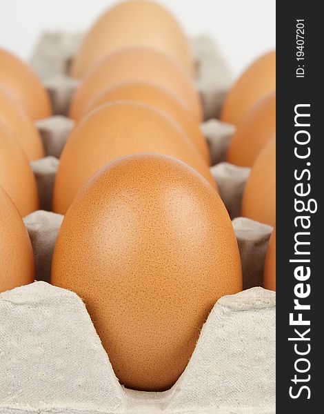 Background of brown eggs in box. Background of brown eggs in box