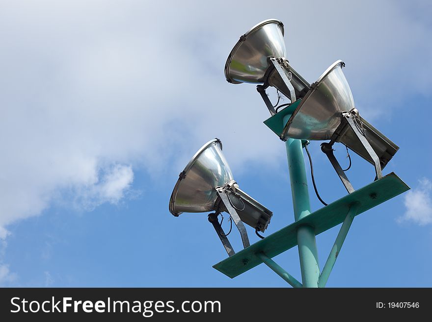 Spot Light shines through the sky. Spotlight shines up to the Grand to see the sky clouds and blue sky, sea