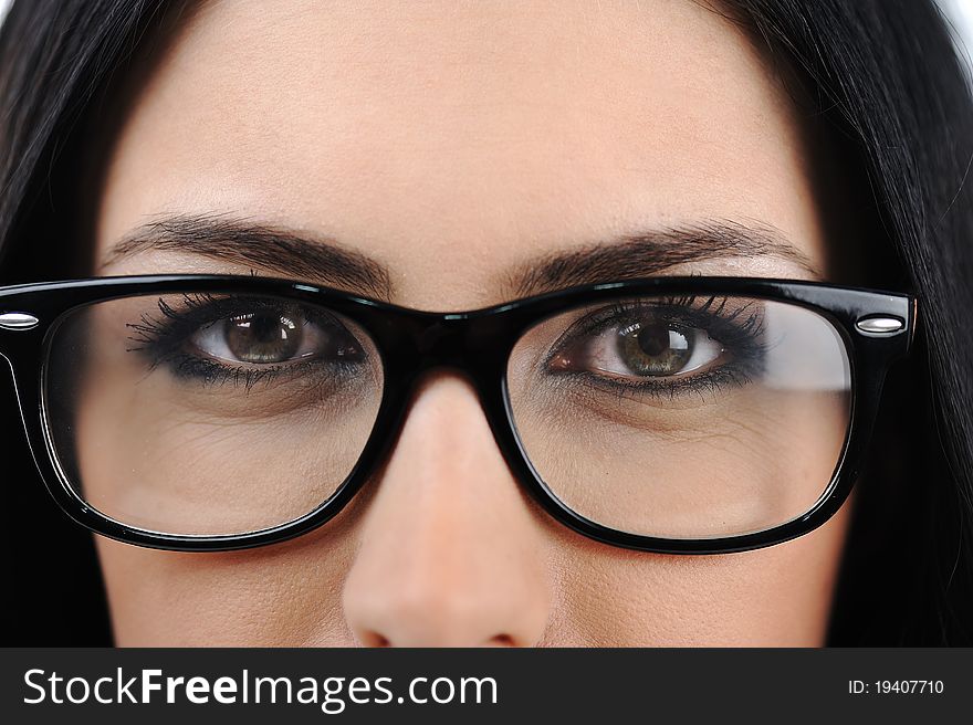 Close-up of a young woman wearing glasses