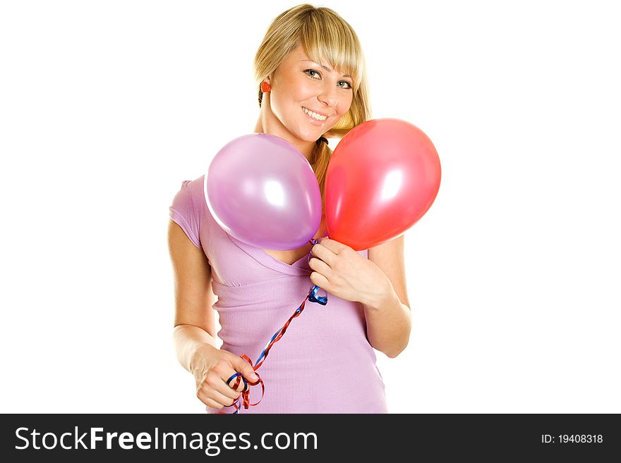 Close-up of a beautiful young woman with colorful balloons balloons. Isolated on a white background. Close-up of a beautiful young woman with colorful balloons balloons. Isolated on a white background