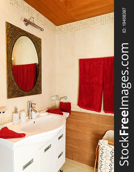 Modern bathroom with tiled walls