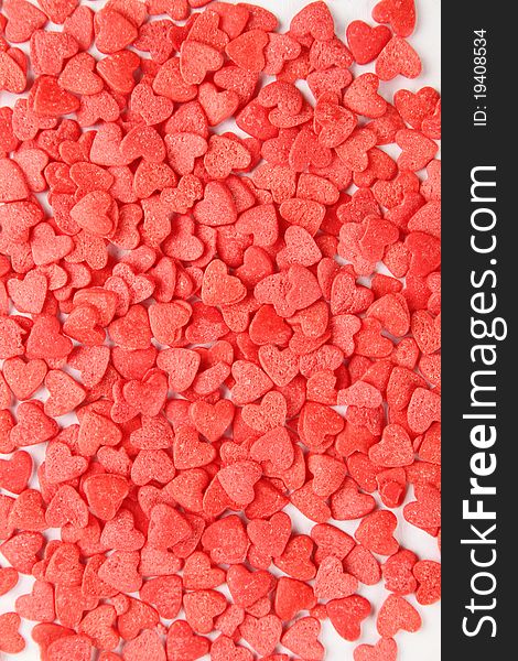 Background of a large number of red hearts. Tasty Baking decorations. Background of a large number of red hearts. Tasty Baking decorations