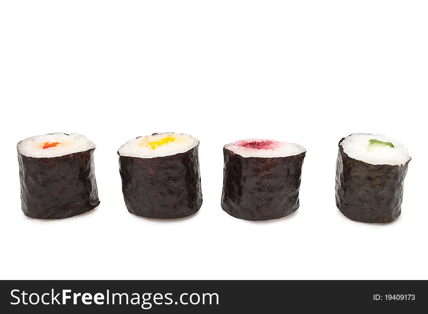 Four fresh Maki Rolls arranged horizontally over white. Four fresh Maki Rolls arranged horizontally over white