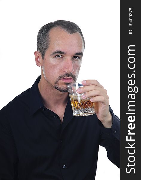 Good looking man in black shirt having a drink