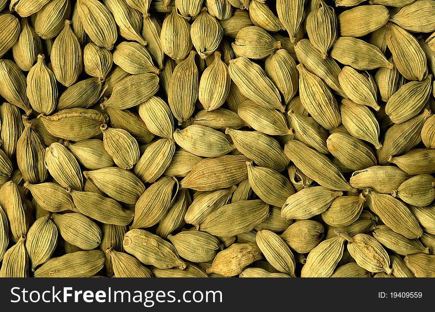 Cardamom spice macro background texture. Cardamom spice macro background texture