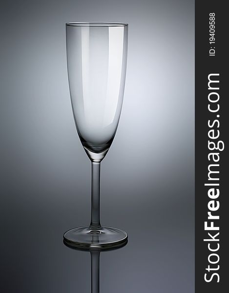 Empty glass goblet with reflection