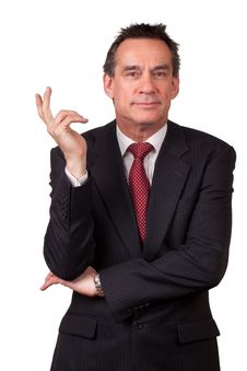 Smiling Business Man In Suit Gesturing With Hand Royalty Free Stock Photos Smiling Business Man In Suit Gesturing With Hand Royalty Free Stock Photos