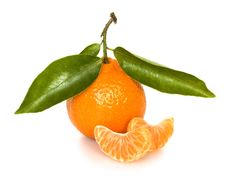 Ripe Tangerine With Segments Stock Photos