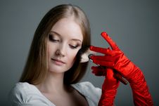 Girl In Gloves With Brush Stock Photo Girl In Gloves With Brush Stock Photo