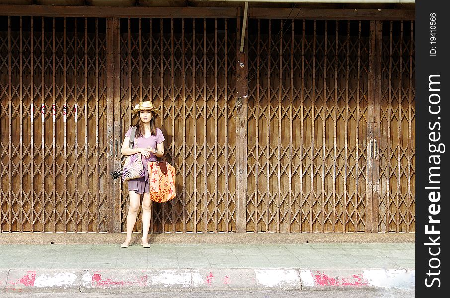 Young woman wearing hat on the street. Young woman wearing hat on the street