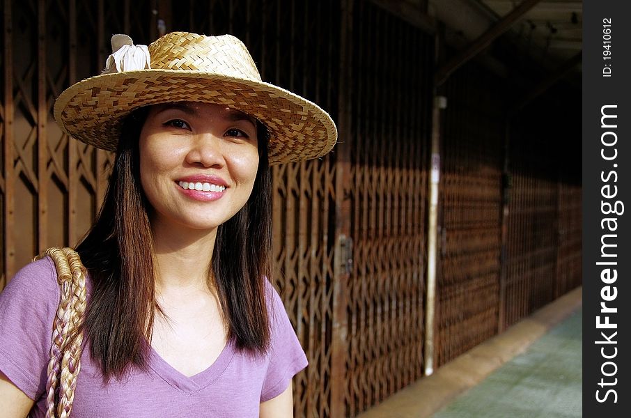 Young woman wearing hat on the street. Young woman wearing hat on the street