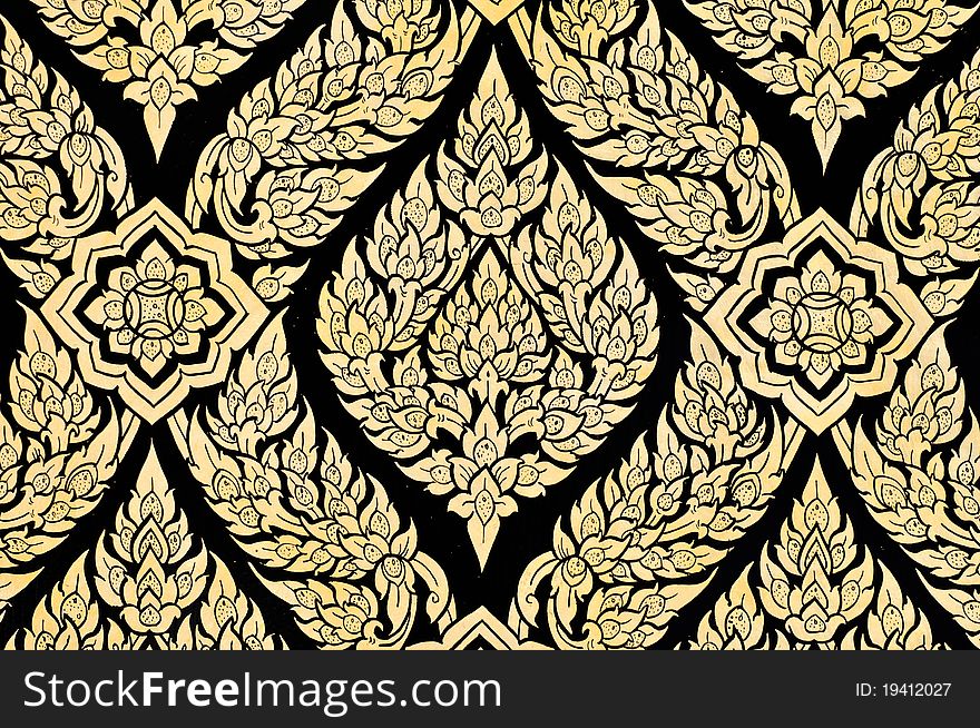 Old Thai design using gold on black adhesive from trees. Old Thai design using gold on black adhesive from trees