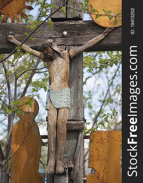 Detail of a very old christian cross, in cemetery. Detail of a very old christian cross, in cemetery.