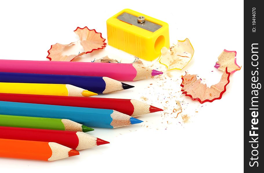 Color pencil,sharpener and wood chips. Color pencil,sharpener and wood chips