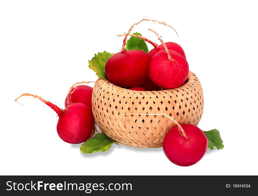 Radishes in the basket over white