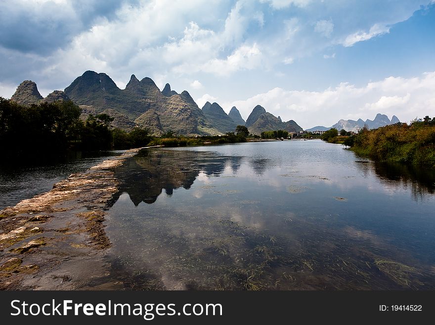 Reflections on a clear water river