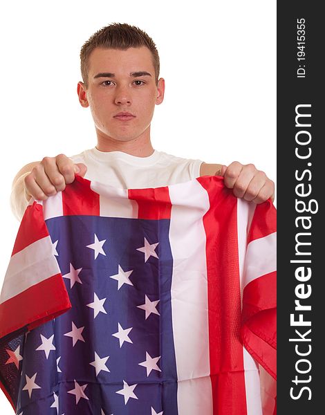 An isolation of an athletic young man holding an american flag. An isolation of an athletic young man holding an american flag.