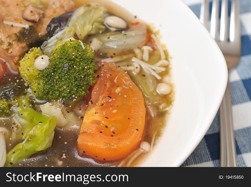 Closeup of healthy mixed vegetable dish prepared with nutritious ingredients.