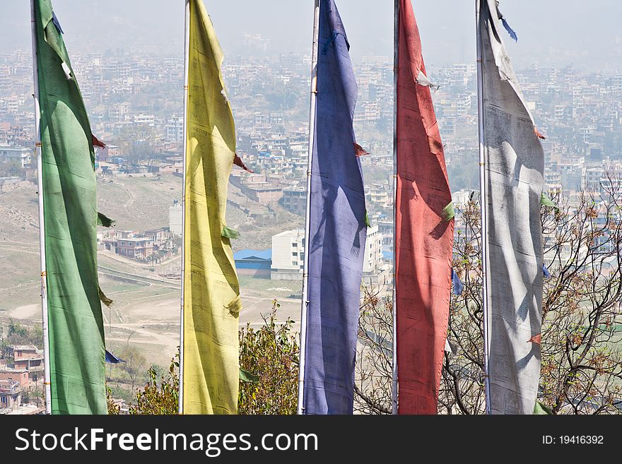 View on Kathmandu over 5 Tibetan prayer flags. View on Kathmandu over 5 Tibetan prayer flags.