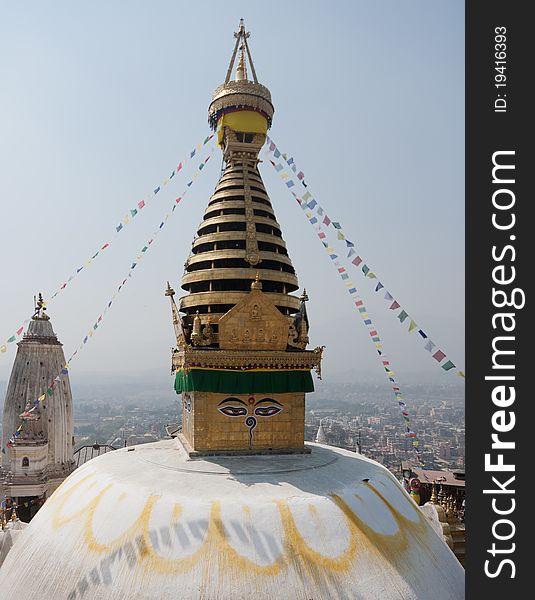Swayambhunath - ancient religious complex in the Kathmandu Valley. It is known as the Monkey Temple as there are rhesus monkeys living in it. Swayambhunath - ancient religious complex in the Kathmandu Valley. It is known as the Monkey Temple as there are rhesus monkeys living in it.