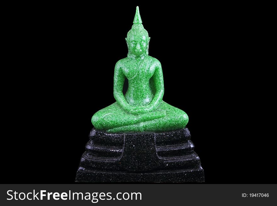 Image of green Buddha on black ground. Image of green Buddha on black ground