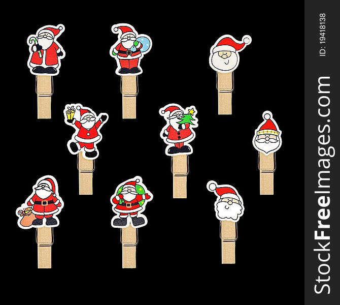 Santa Claus badge on wooden clothespin