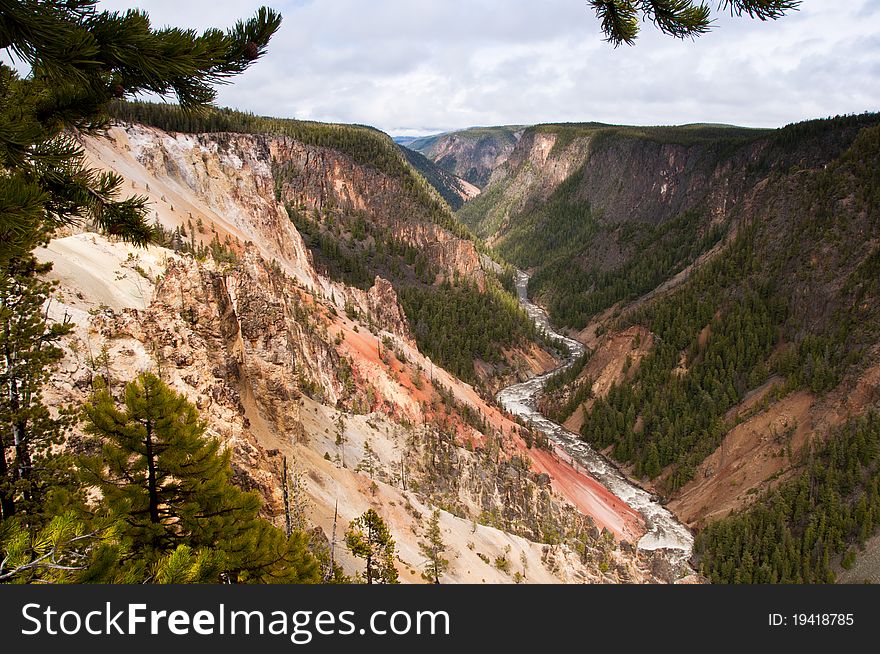 Sun lightning up colorful slopes of Yellowstone Grand Canyon. Sun lightning up colorful slopes of Yellowstone Grand Canyon