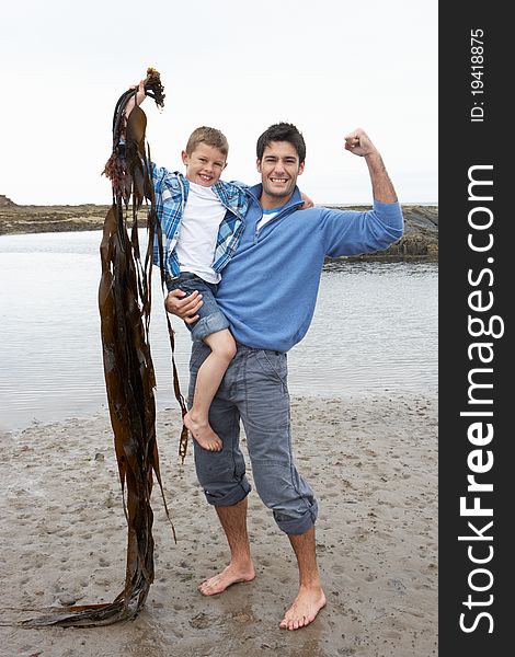 Father and son on beach