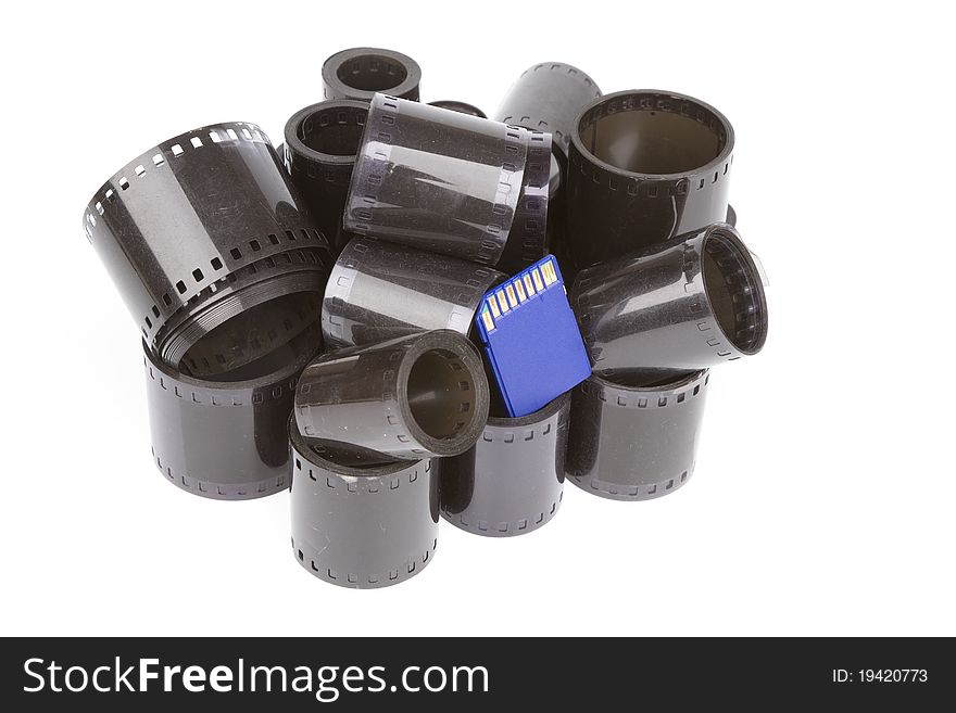 Group 35mm film rolls and sd flash card isolated on white background