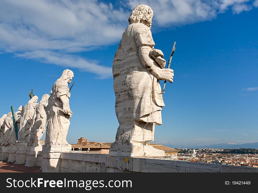 Back side of statue on roof of St. Peter's Basilica in Vatican City in Rome, Italy. Back side of statue on roof of St. Peter's Basilica in Vatican City in Rome, Italy