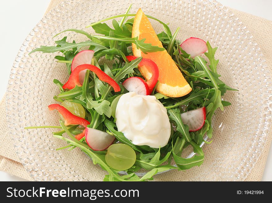 Salad greens with radish, pepper and grapes. Salad greens with radish, pepper and grapes
