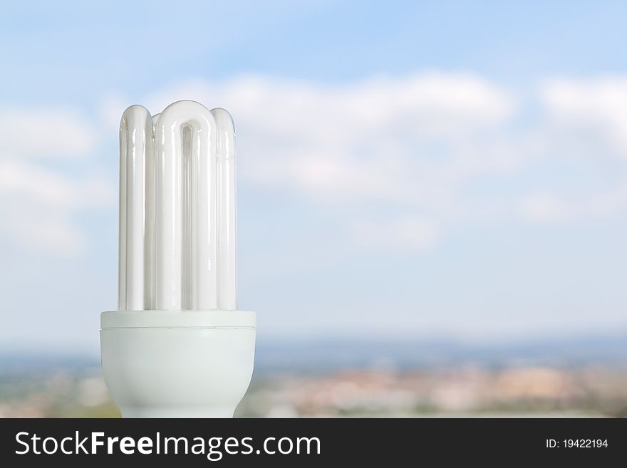 White fluorescent lamp against the sky