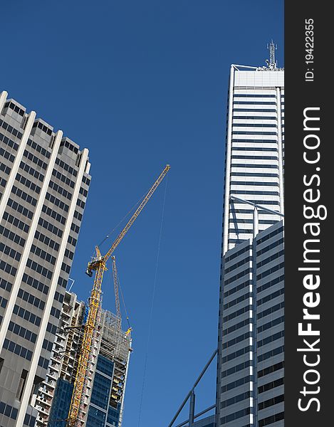 Upward View of Construction Site and Skyscraper in Perth Business District, Western Australia. Upward View of Construction Site and Skyscraper in Perth Business District, Western Australia