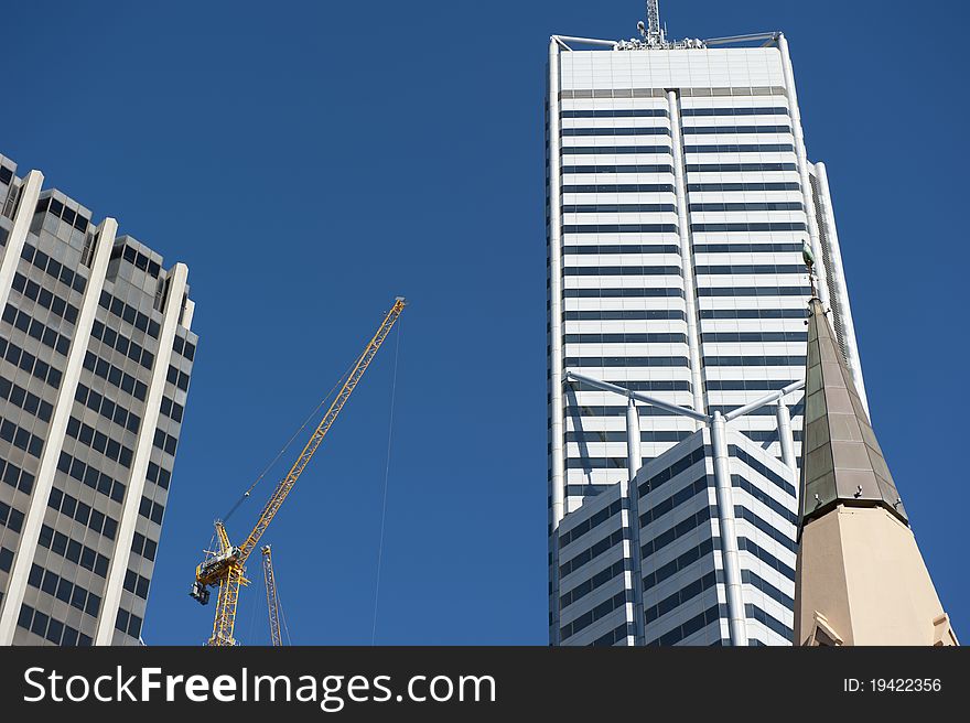 Upward View of Construction Site and Skyscraper in Perth Business District, Western Australia. Upward View of Construction Site and Skyscraper in Perth Business District, Western Australia