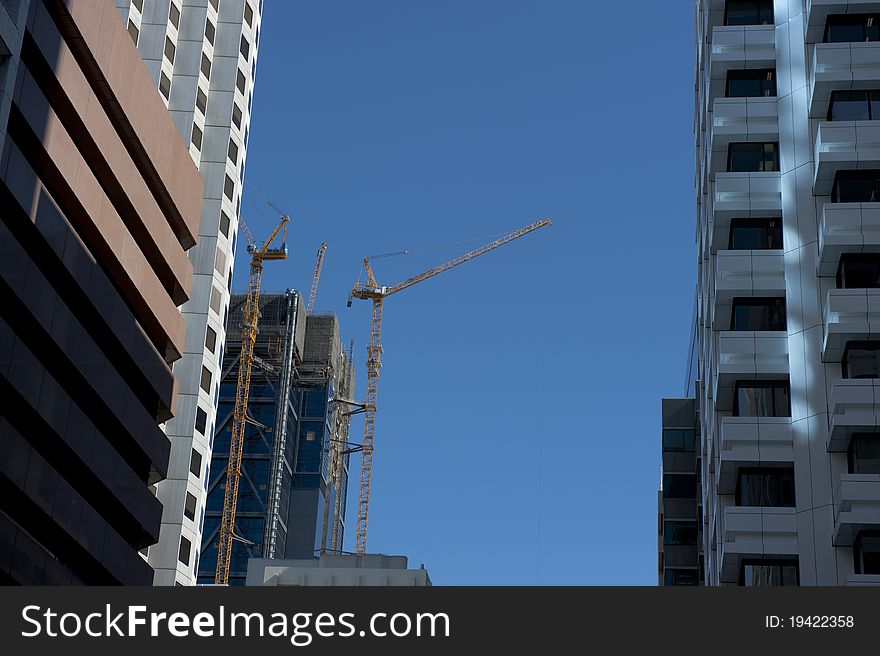 Upward View of Construction Site and Skyscraper in Perth Business District, Western Australia. Upward View of Construction Site and Skyscraper in Perth Business District, Western Australia