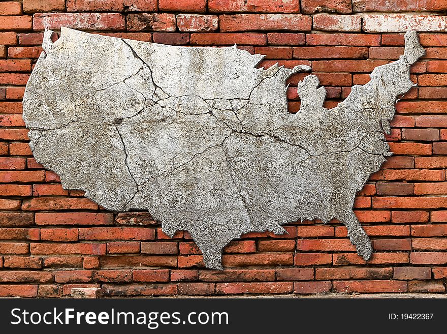 Cement cracking image United State map on Red brick wall