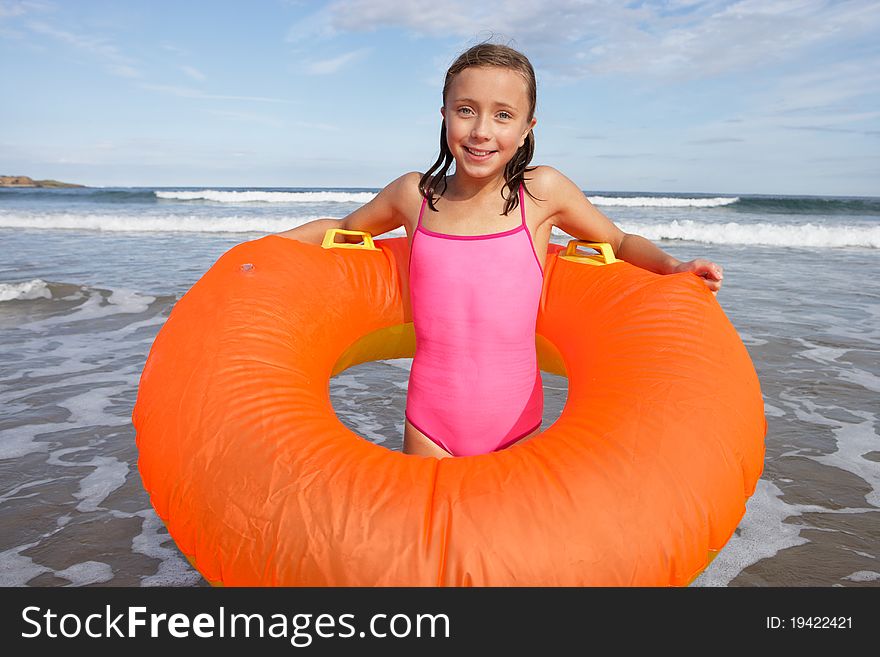 Girl with rubber ring smiling