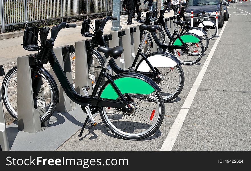 Rental cycles for public use in urban setting. Rental cycles for public use in urban setting
