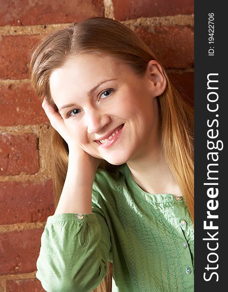 Portrait of young woman smiling at camera