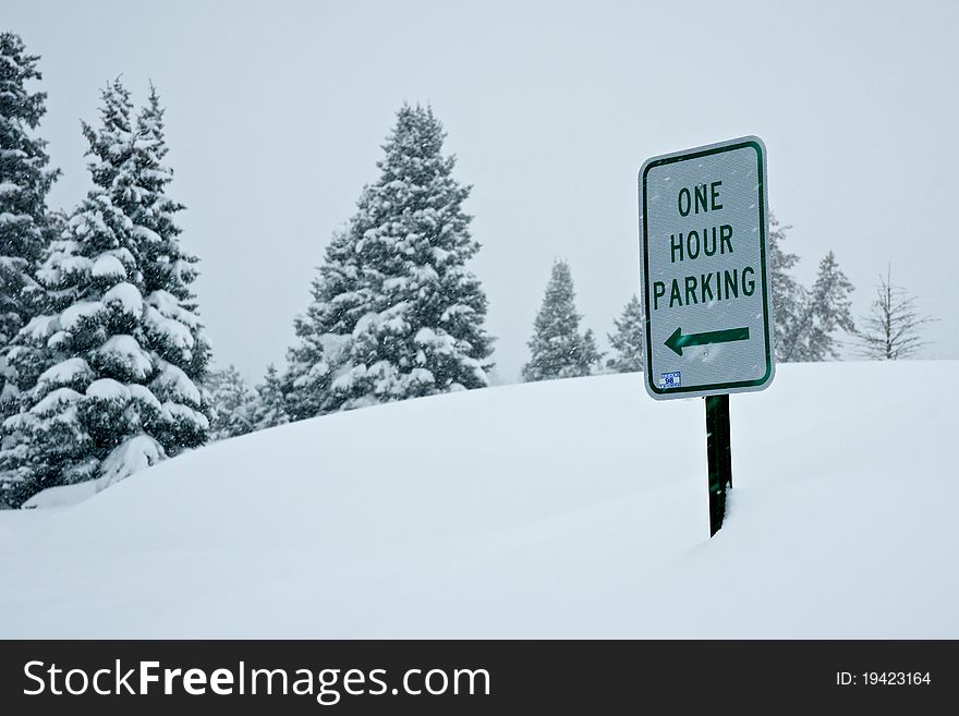 The level of snow rises through a parking lot on I-70 during a Colorado winter. The level of snow rises through a parking lot on I-70 during a Colorado winter.