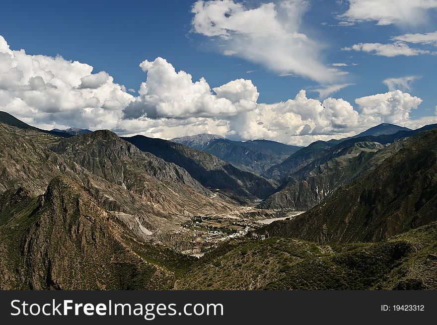 Looking down over a small village in the mountains around Shangri La, Yunnan Province, China. Looking down over a small village in the mountains around Shangri La, Yunnan Province, China.