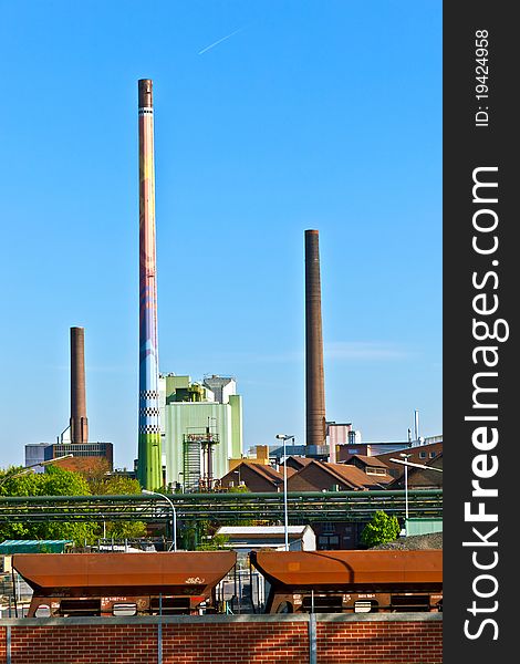 Industry park with silo and chimney and blue sky