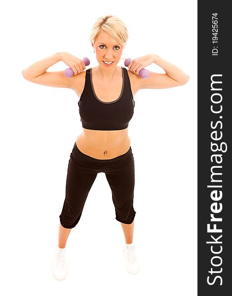A young female performing a weight training exercise on isolated white background