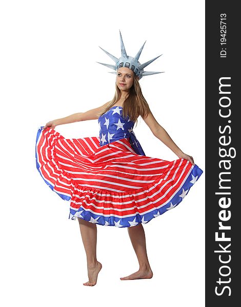 Attractive blond woman in costume Statue of Liberty