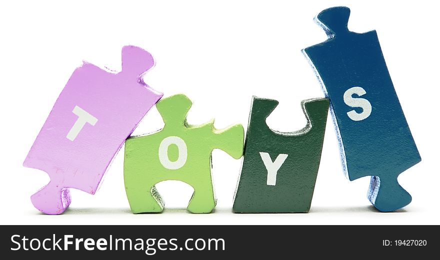 Wooden colored puzzle blocks sign. Wooden colored puzzle blocks sign