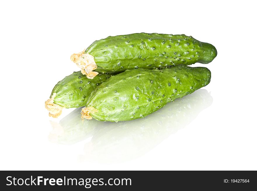 Cucumbers isolated on white and reflection