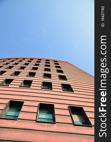 Windows of Modern Building towards Blue Sky